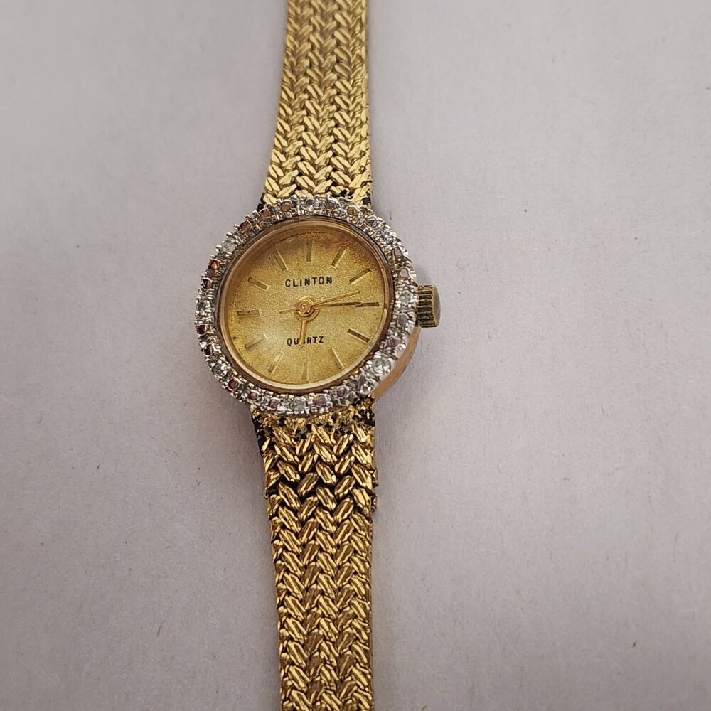 Clinton goldtone womens watch with quartz face
